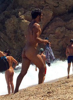 Naked Greek guy on the beach