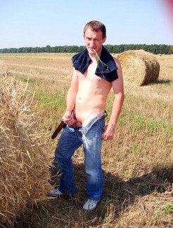 A young villager gets naked in the field