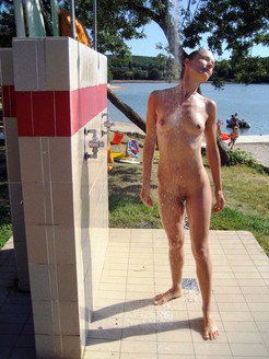 The nudist public showering at the beach...