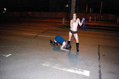 Submissive slave girl on leash, night walk