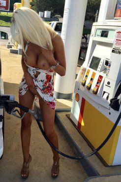 Naked blonde girl at gas station