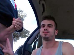 Handsome european gay sucking cock in the car