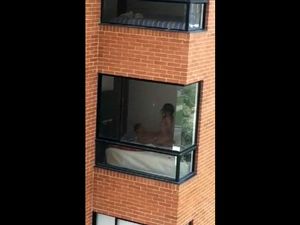 Voyeur sex video filmed through dorm...