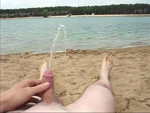 Czech boy piss on public river beach