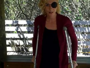 Pretender woman on crutches flashing tits