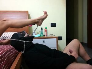 Fetish man slave in mask licks feet of his...