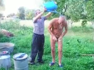 Mature dad takes shower nude outdoor