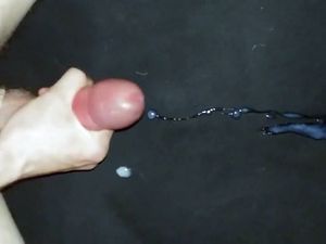 Amateur cum blast on a black sheet