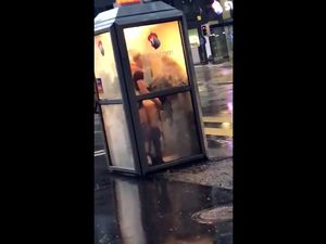 British couple fucks in telephone booth
