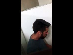Smoking guy fuck jock in public toilet