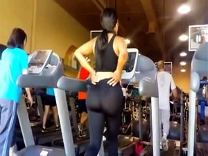 Latina big ass in yoga pants walking in...