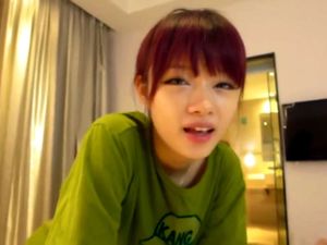 Beautiful chinese teen girl give a footjob...