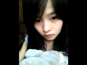 Cute chinese teen dancing on webcam