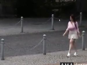 Busty girl walking, no bra, jiggling