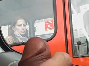 Guy wanking in the car and casual woman...