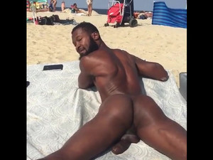 Huge cocked negro sunbathing nude
