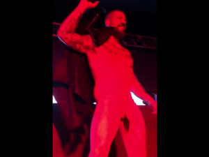 Bearded gay dancing Striptease at gay club