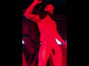 Bearded gay dancing Striptease at gay club